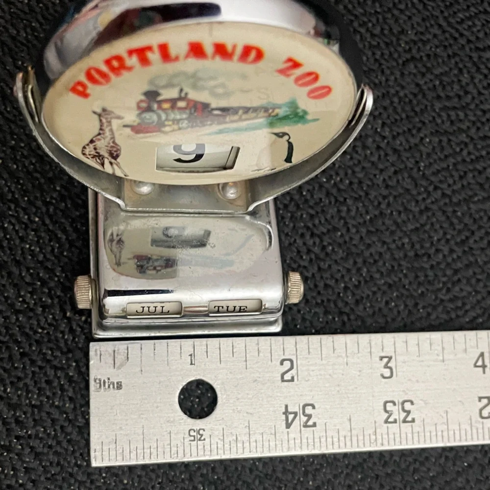 VTG metal perpetual flip calendar featuring Portland Zoo graphic
